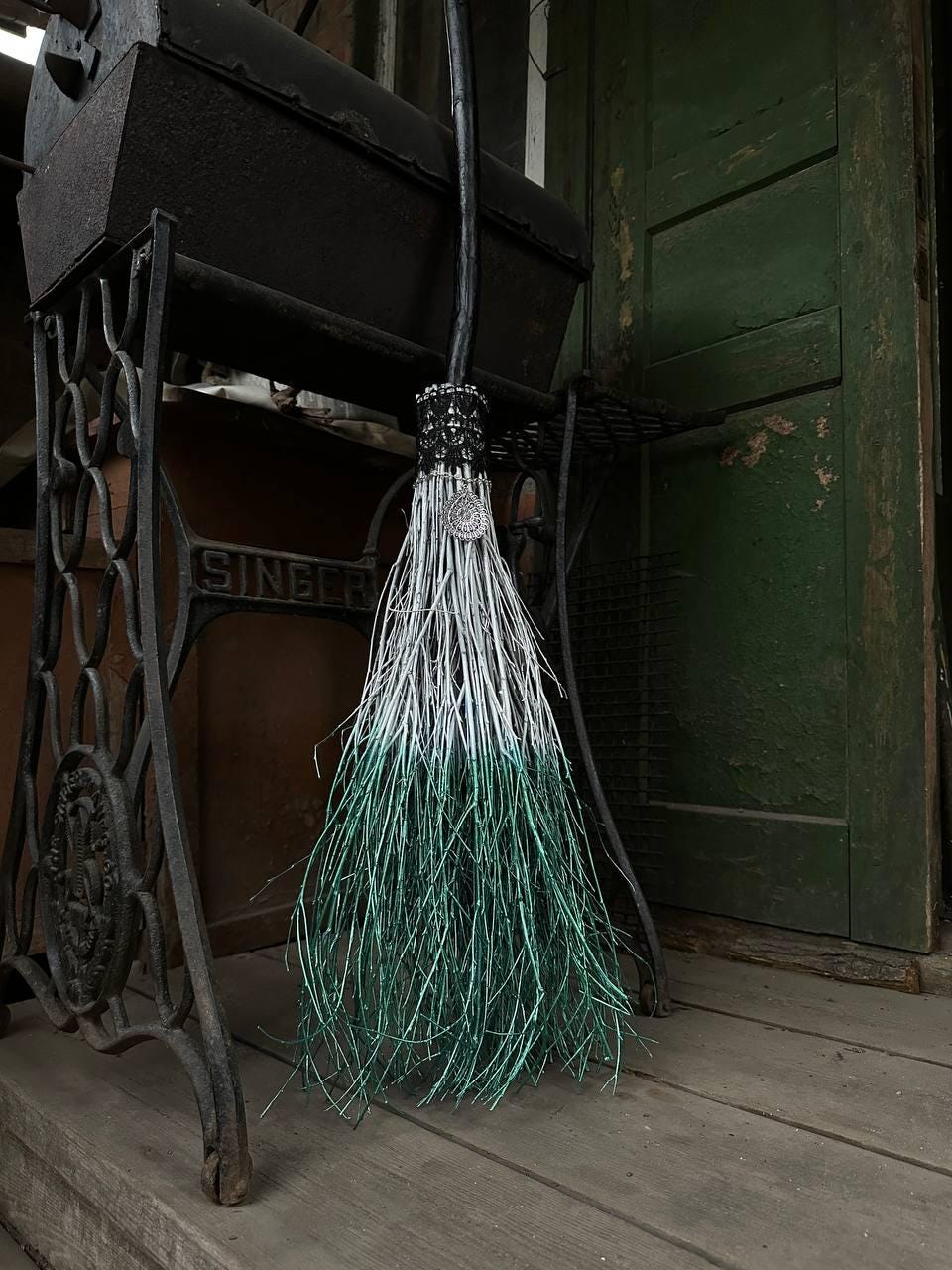 White and Metallic Green Witch Broom With Lace And Pendant