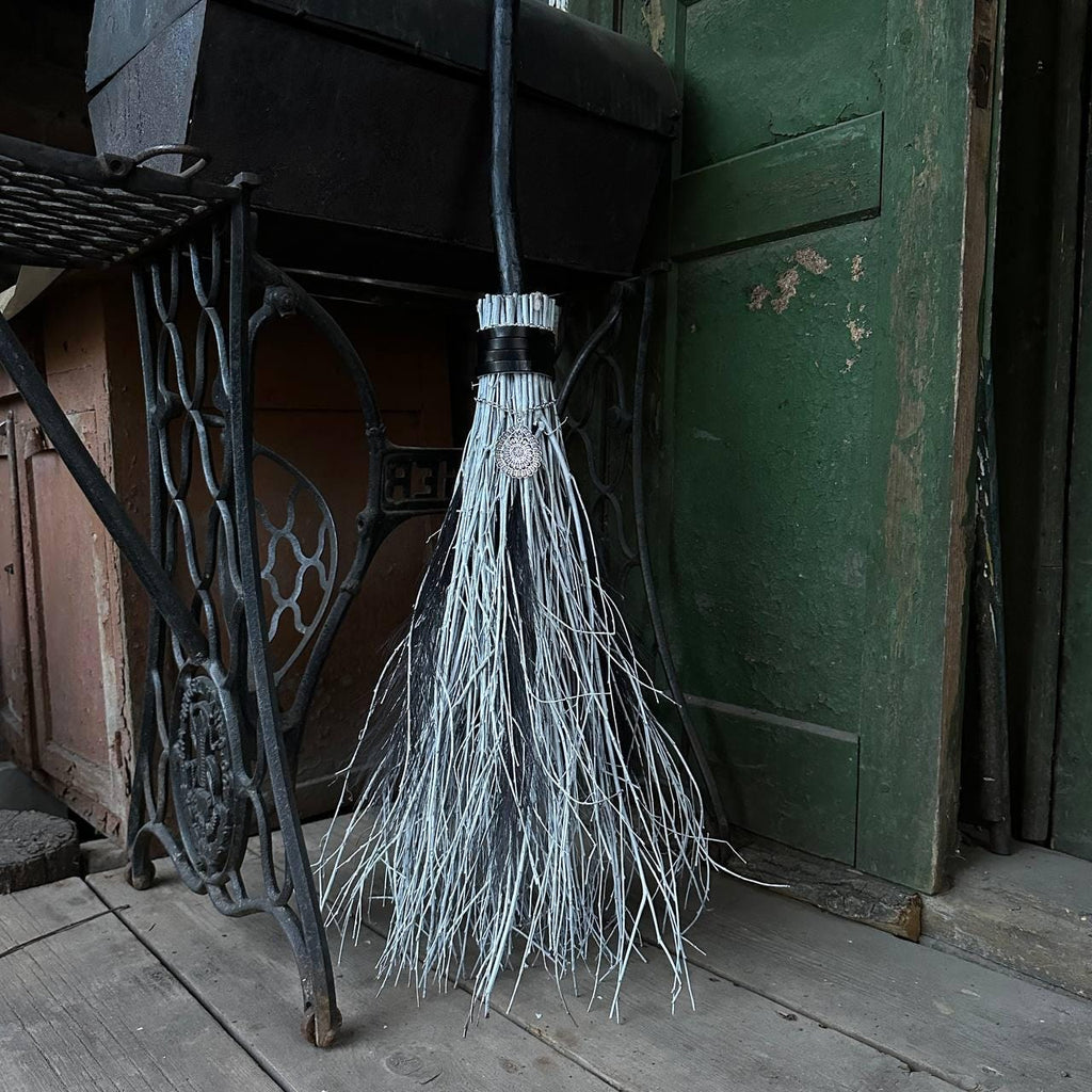 Feather-decorated witch broom for rituals and ceremonies – USA shipping available