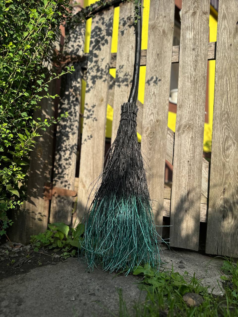 Handmade witch broom with natural twigs, perfect for Halloween